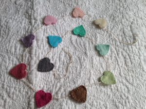 Pastel colours, mini hearts, hand sewn felt bunting.