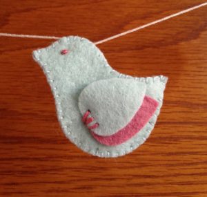 Hand sewn, pastel coloured felt, bird and heart bunting.