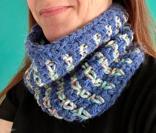 A handmade, super chunky, crocheted neck warmer in a mixture of pastel hues and denim blue.Made using a chunky, soft and lightweight mix yarn. 60% Acrylic / 25% Cotton / 15% Wool.