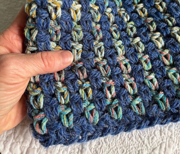 A handmade, super chunky, crocheted neck warmer in a mixture of pastel hues and denim blue.Made using a chunky, soft and lightweight mix yarn. 60% Acrylic / 25% Cotton / 15% Wool.